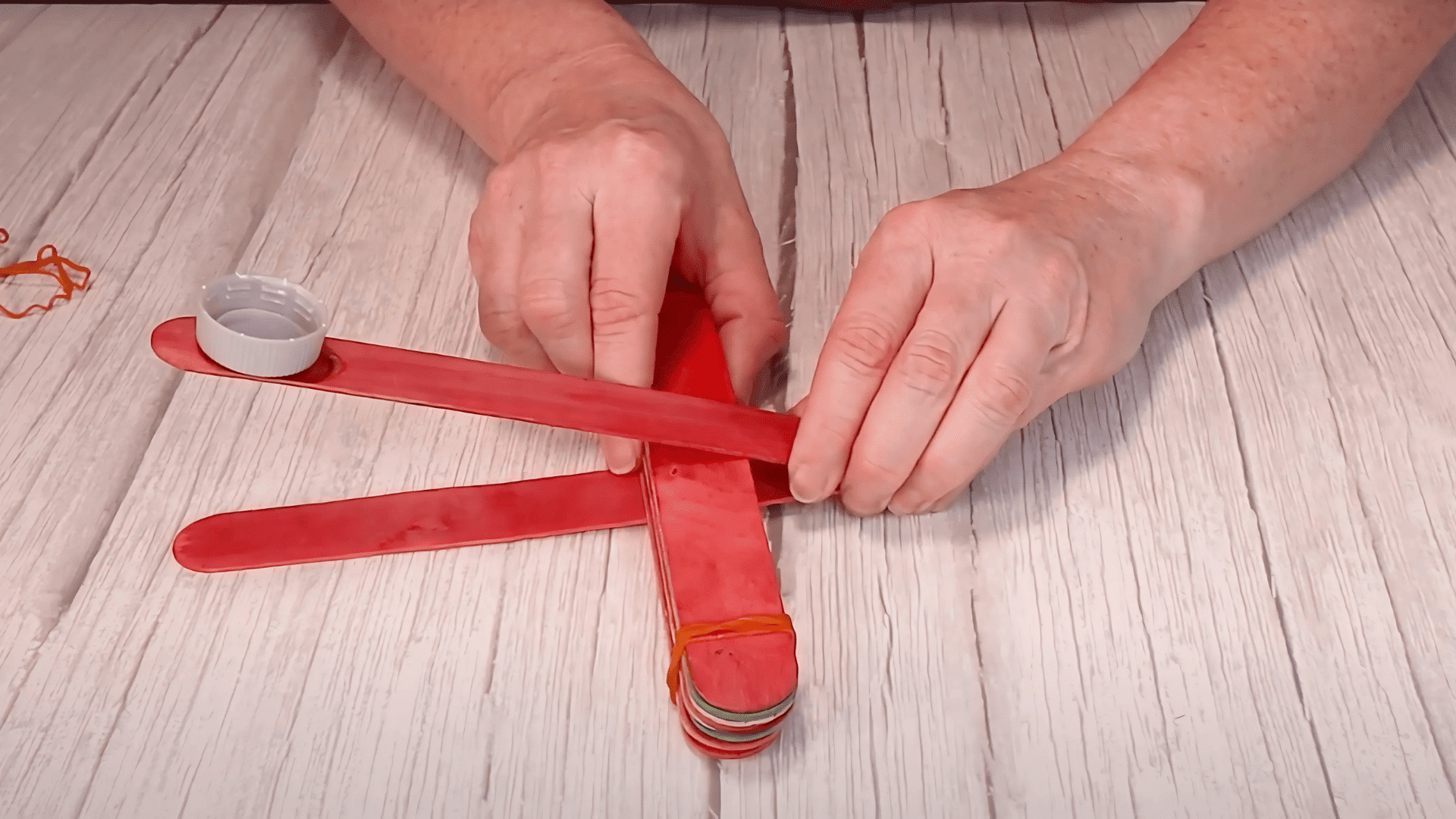 attach lever to fulcrum