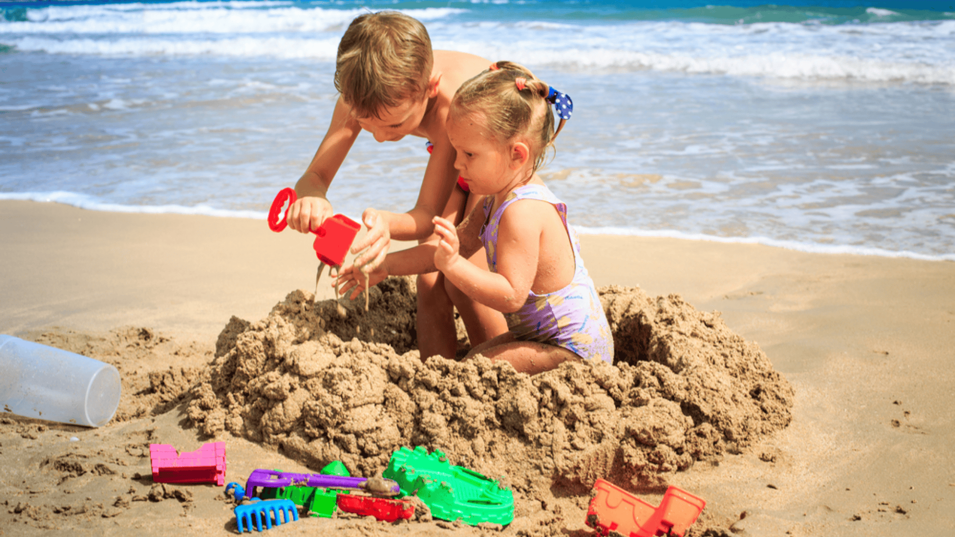 kids playing on sand