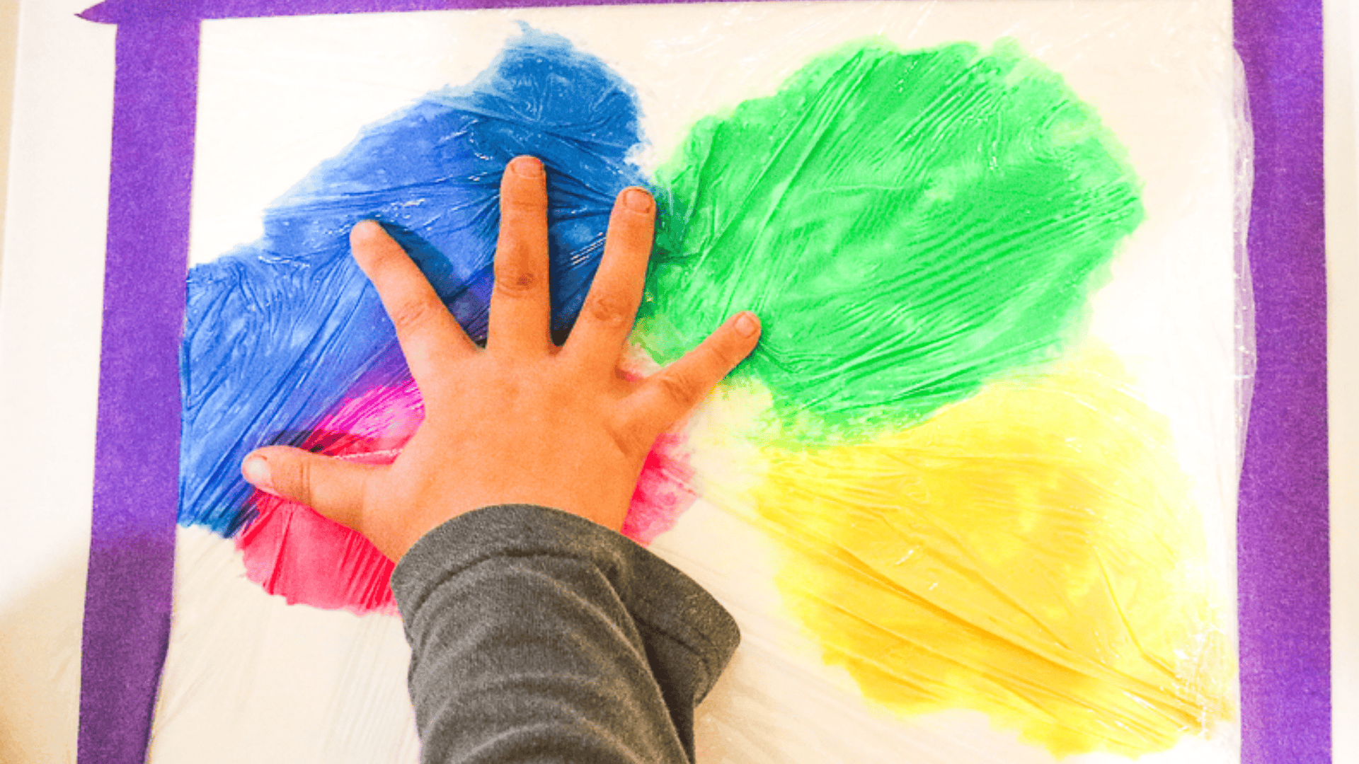 mess free finger paint with cling wrap