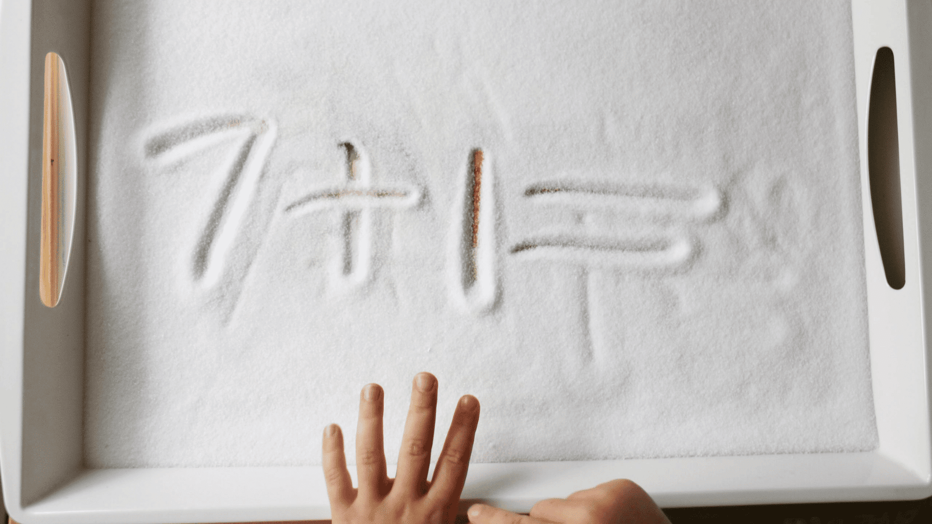 number tracing in salt trays