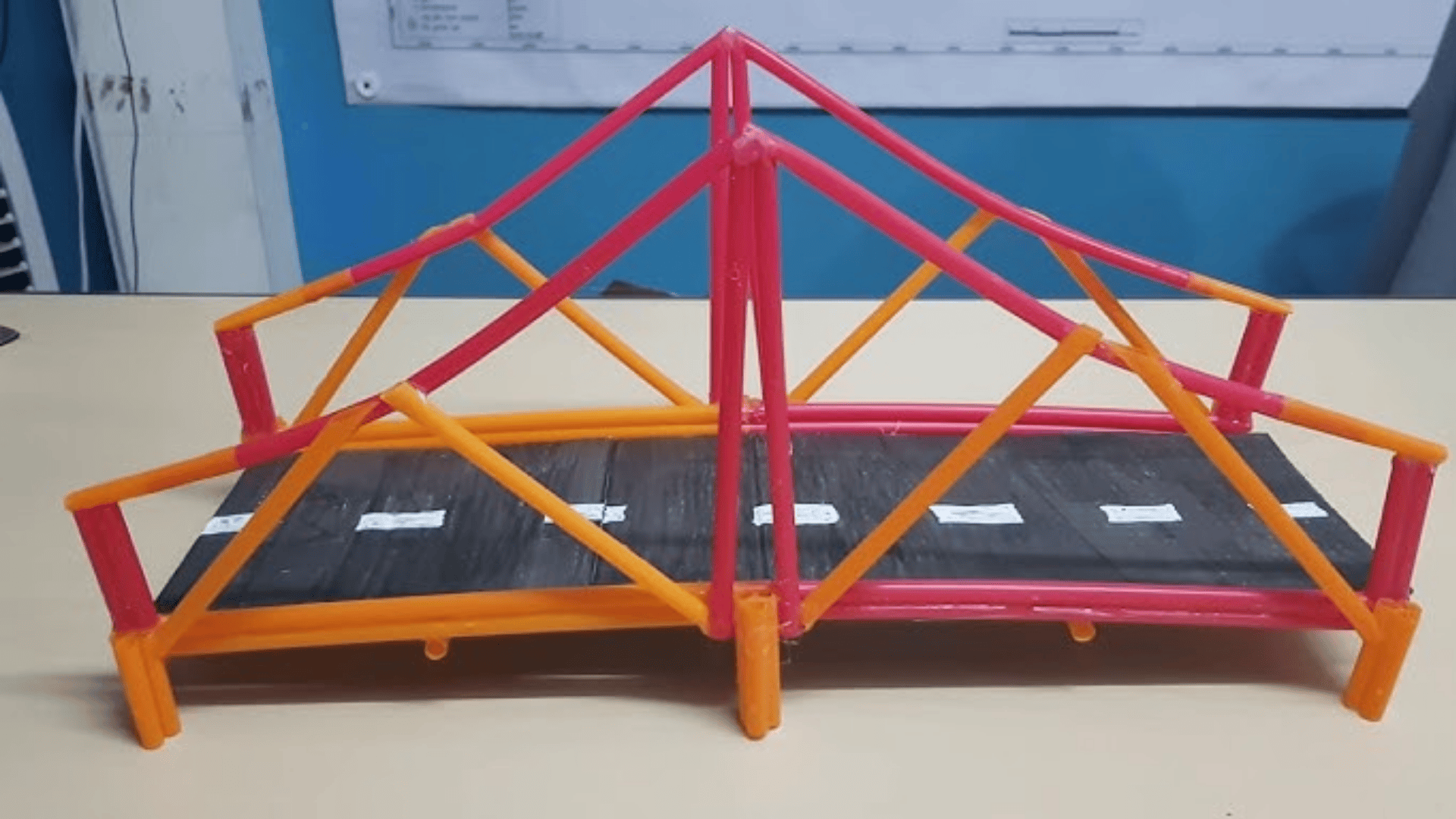 paper bridge and straw tower