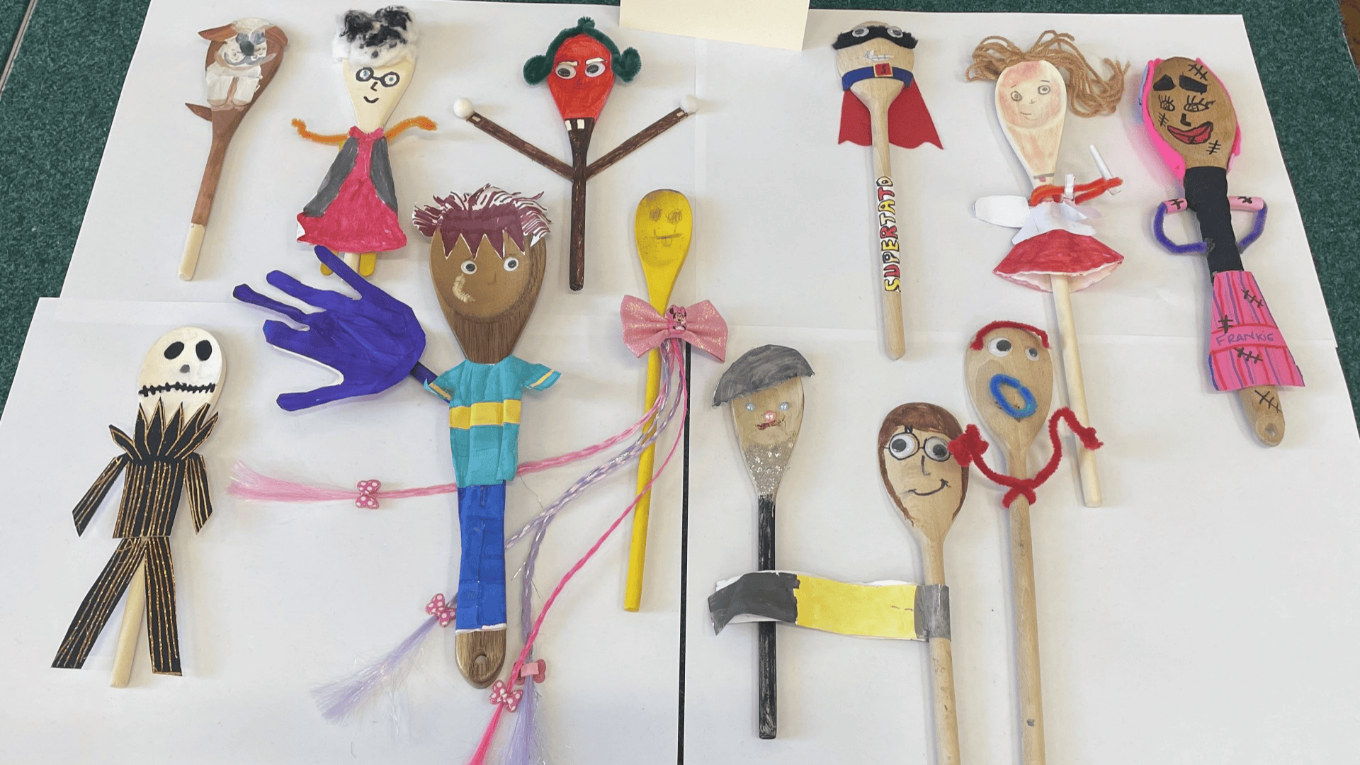 stick puppets with yarn and googly eyes