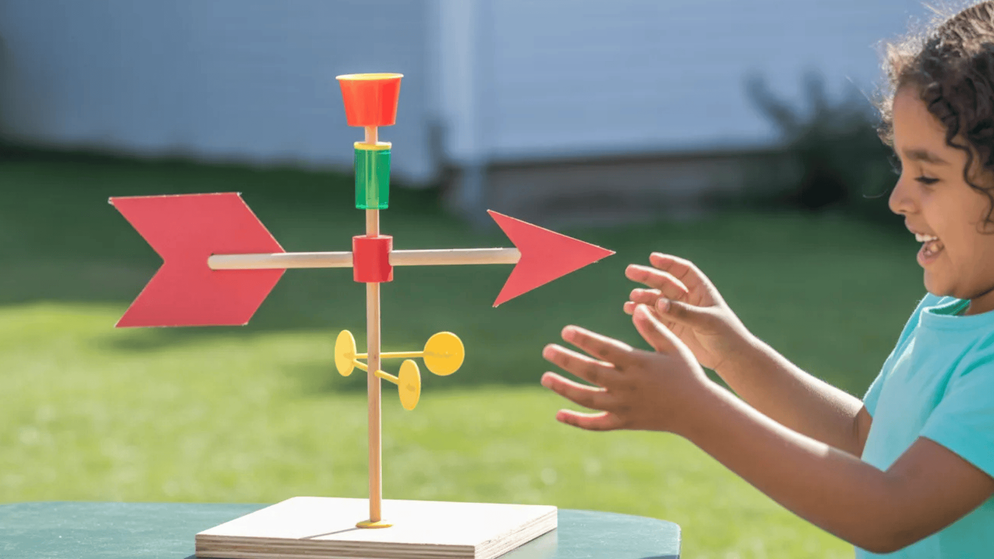 a homemade weather vane spinning in the wind