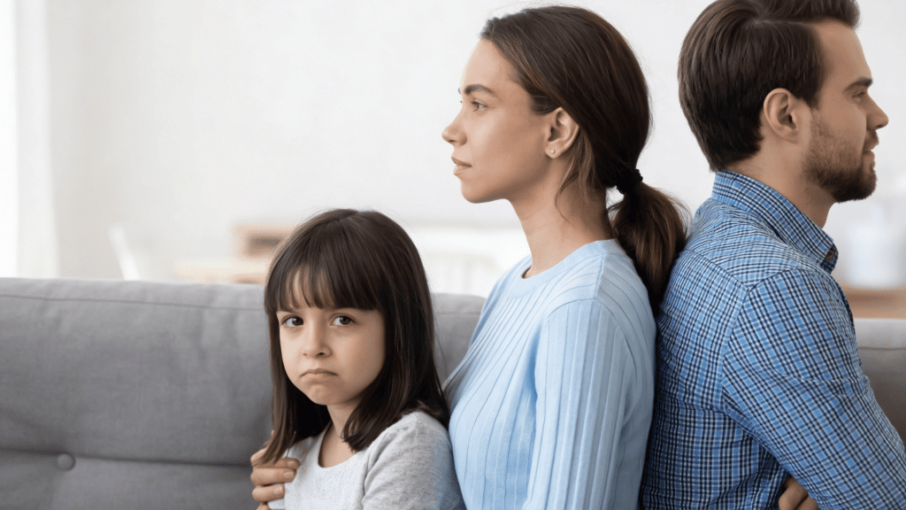 an upset girl with father and mother