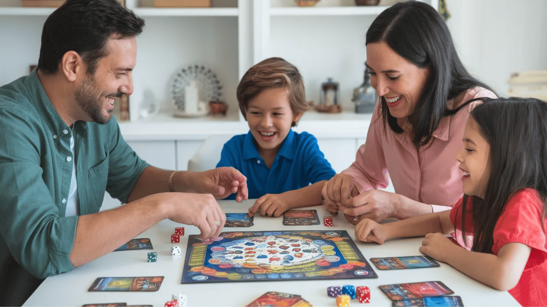 family with two children smiling and playing a board game with cards and dice together at a table during family game night