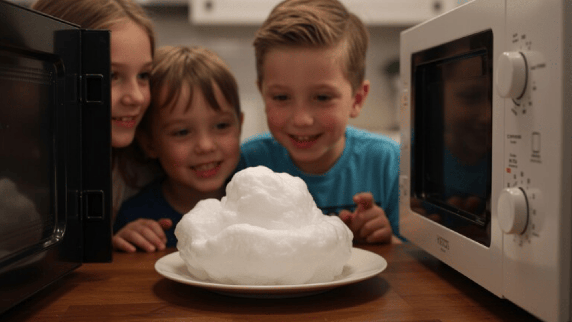 practical small apartment scene with pallet-wood frame mounted on plain wall, nearby table with glue bottle, basic paint, brush, cardboard backing, acrylic sheet