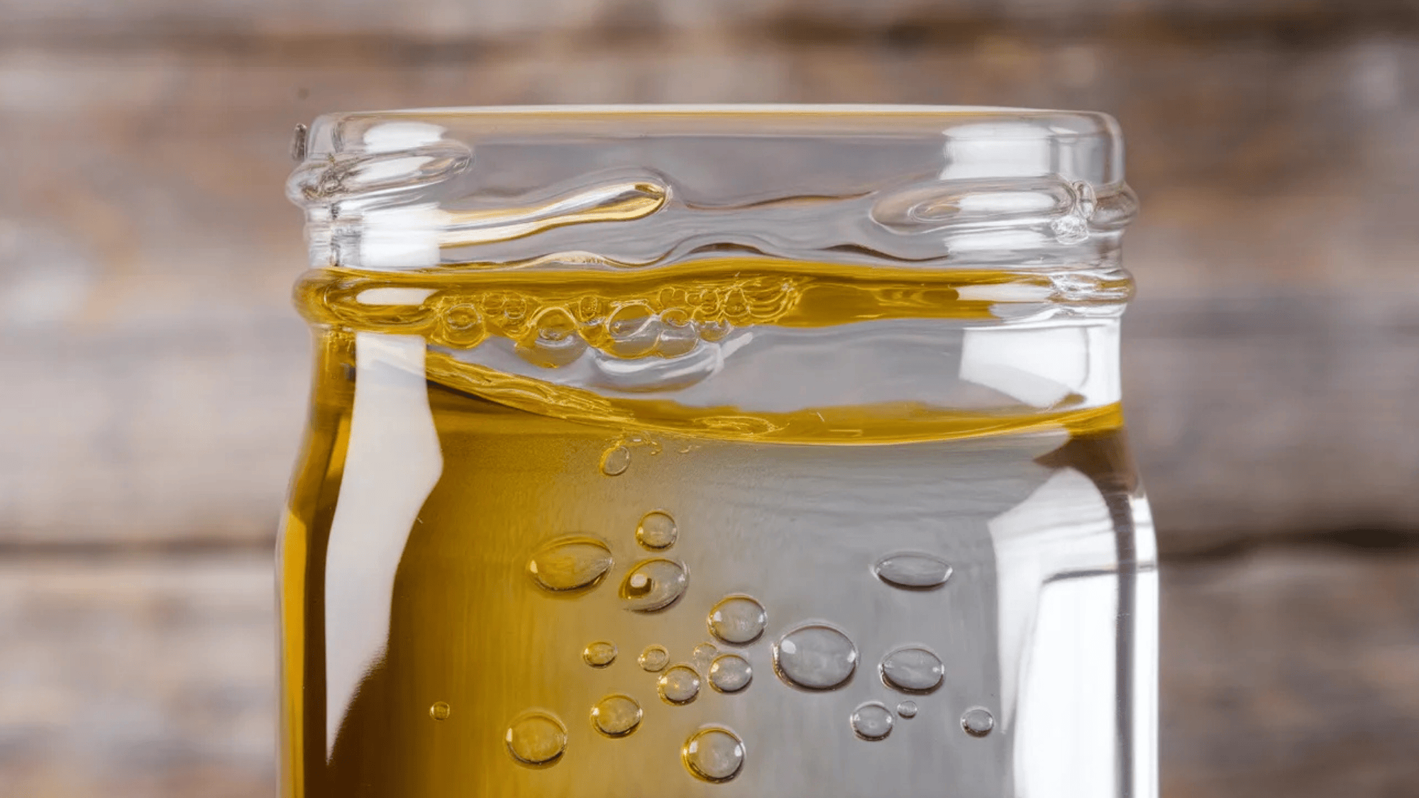 water and oil with bubbling effects inside a bottle