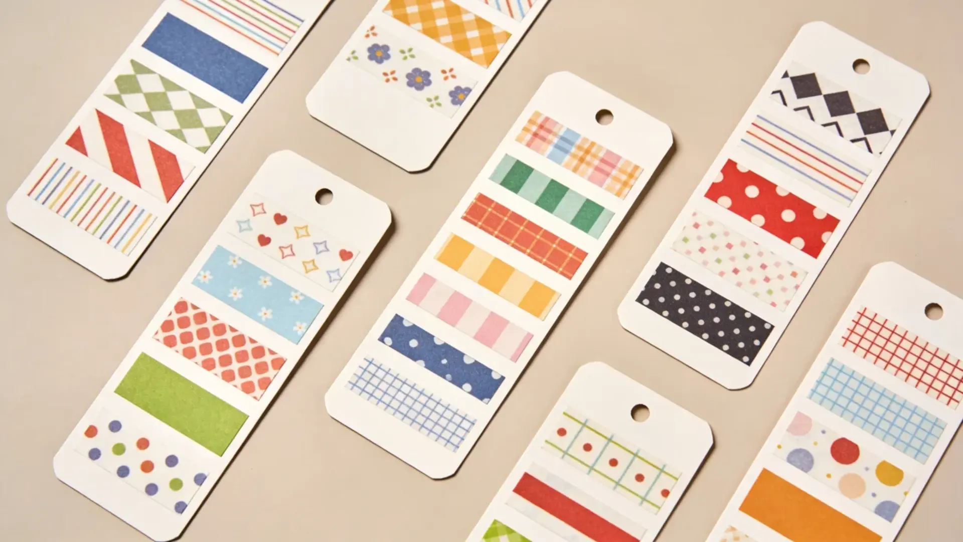 Bookmarks decorated with colorful washi tape patterns