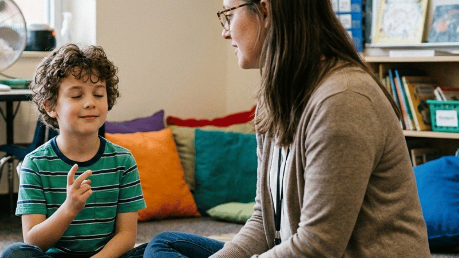 child learning grounding by listening and identifying sounds.