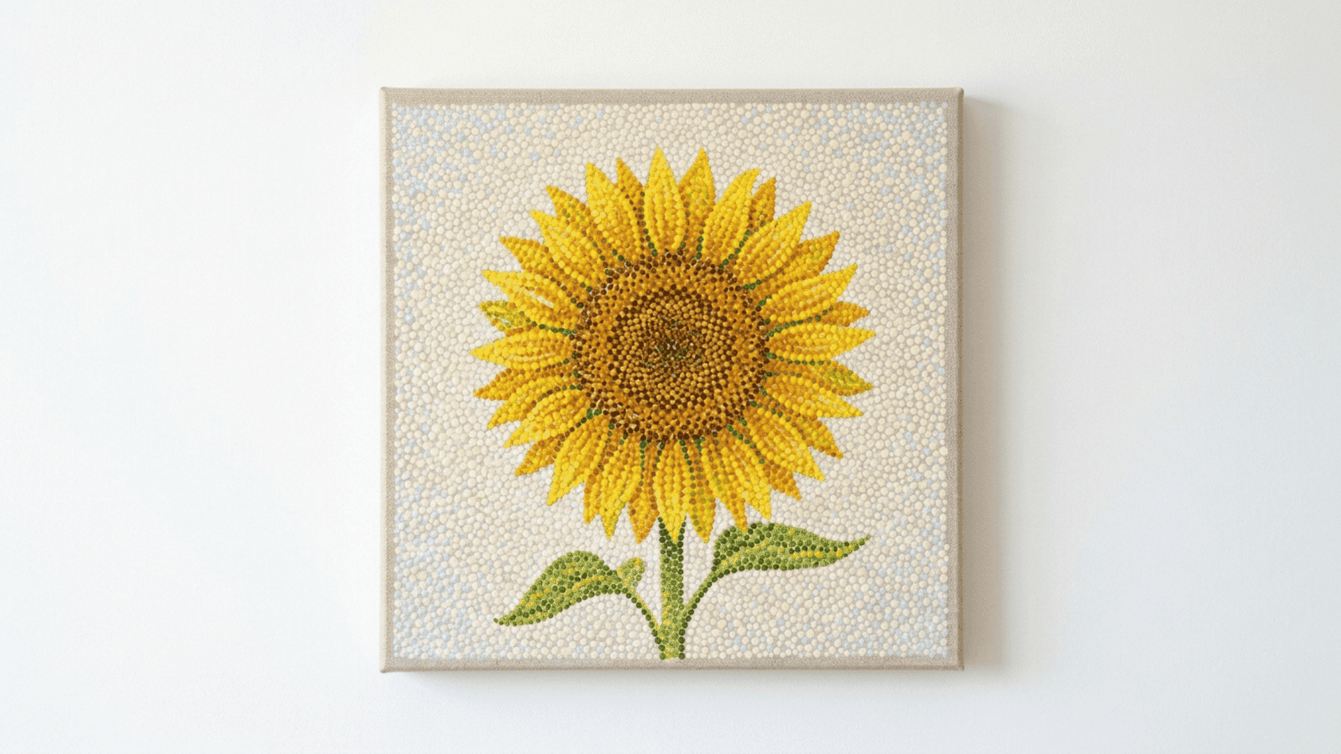 pointillism sunflower painting on a front facing canvas built from small dots of yellow orange green and brown paint