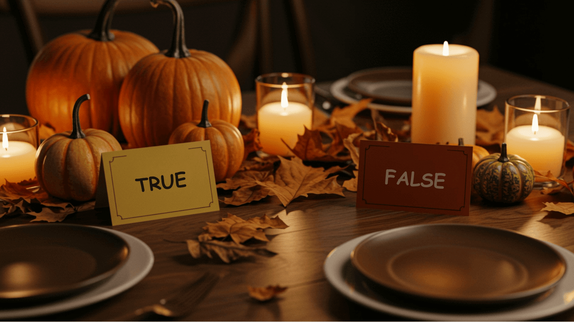 thanksgiving table setup with candles, pumpkins, and “true or false” cards for a festive holiday activity