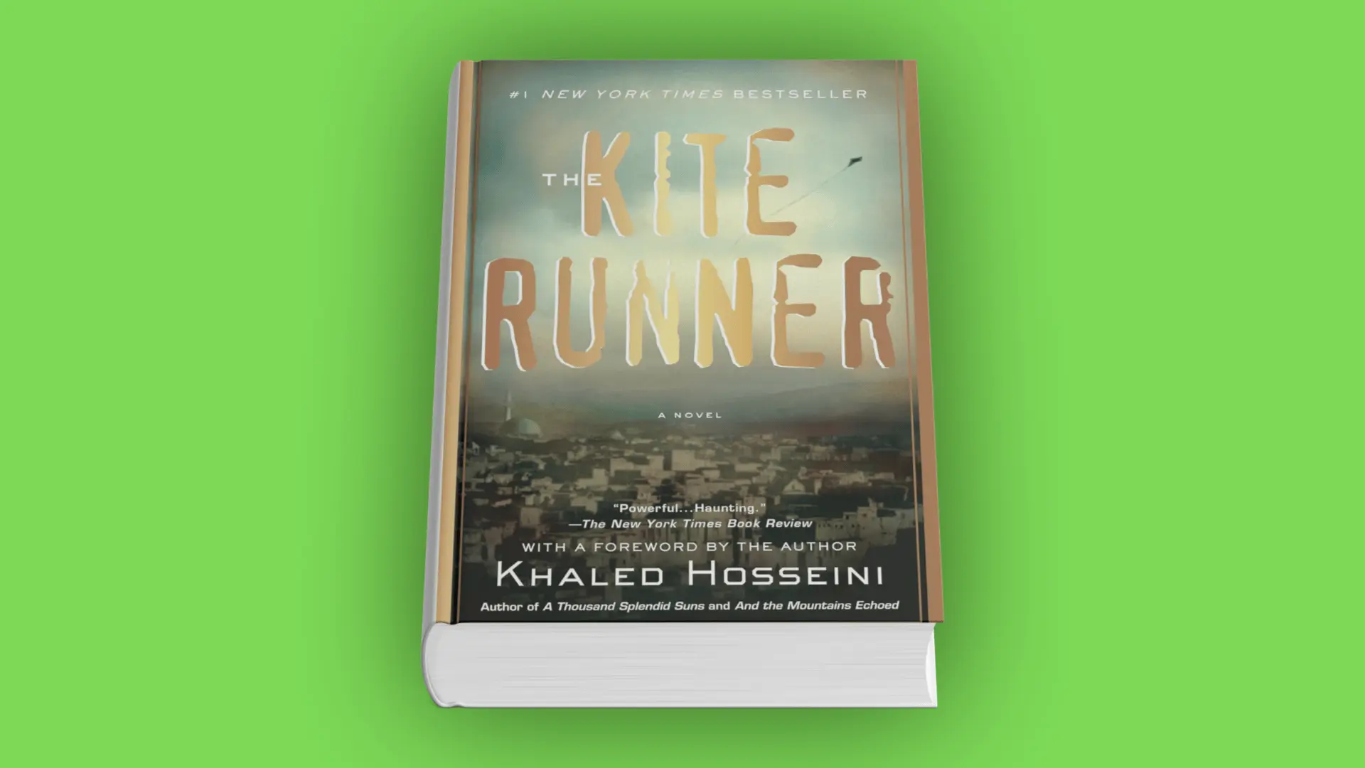 Book cover of The Kite Runner by Khaled Hosseini with large title text over a cityscape and a kite in the sky