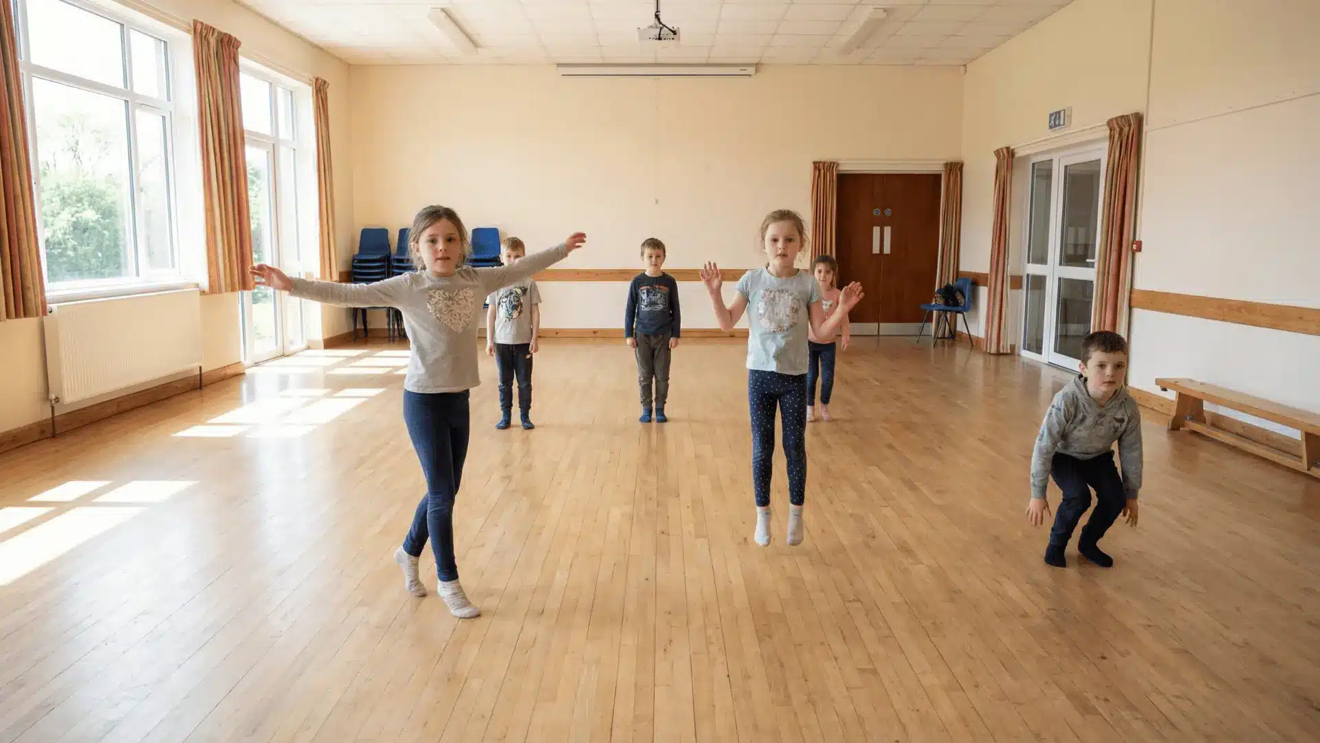 Children dancing and freezing in place in an indoor room