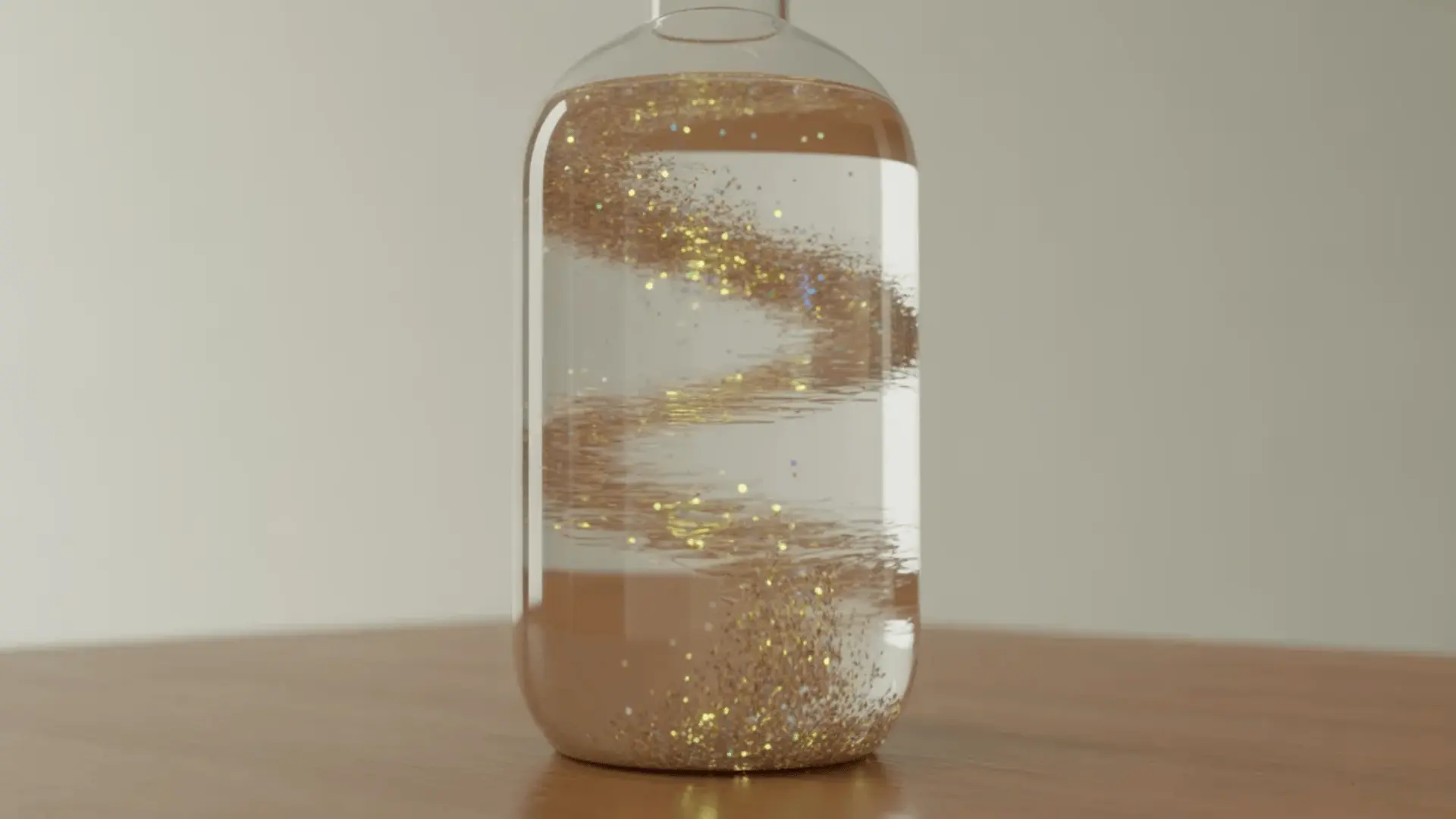 Clear bottle with water and glitter swirling inside placed on a table