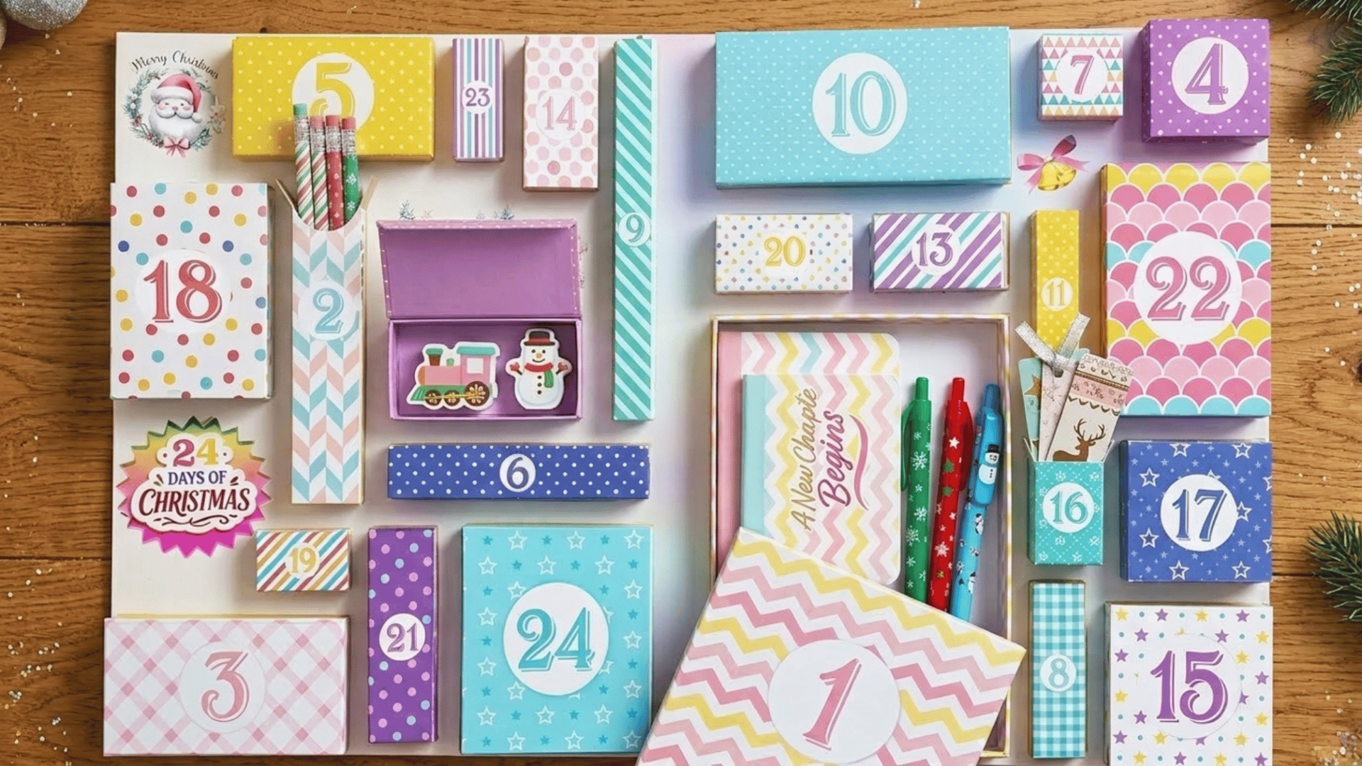 colorful stationery advent calendar with pens, notebooks, stickers, and festive numbered gift boxes on wooden table