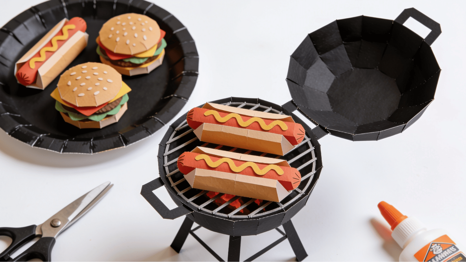 black paper plate bbq grill card with paper food on top fathers day craft idea for toddlers and kindergarteners
