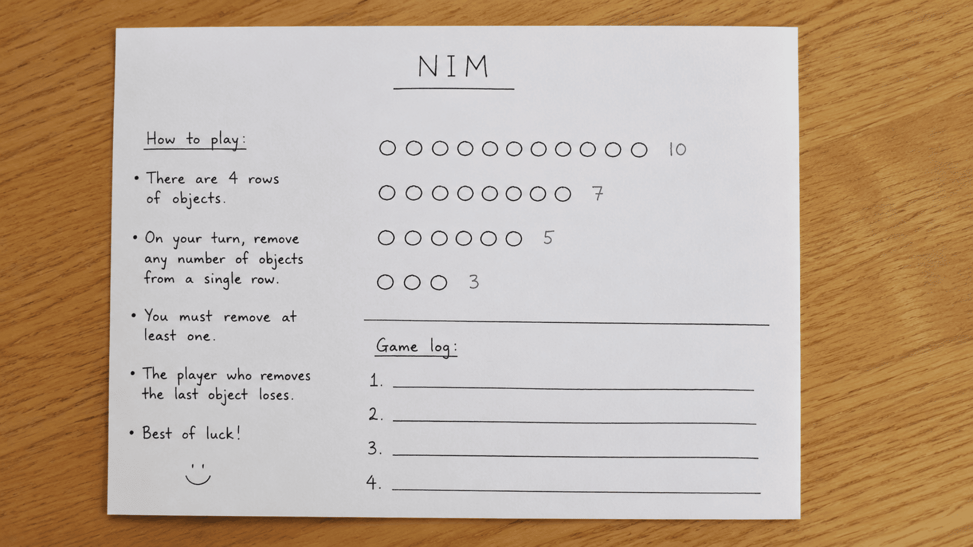 nim game instructions and setup pen and paper game setup on a wooden table with handwritten text and simple indoor setup