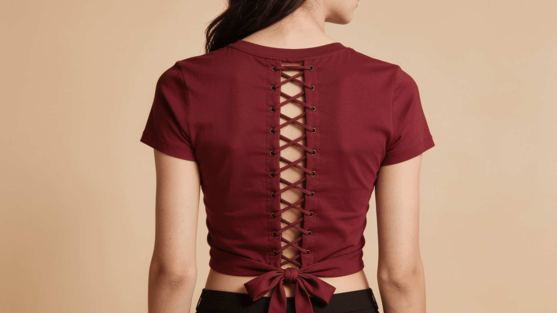 crisscross corset back, woman wearing red tshirt with laced up tshirt