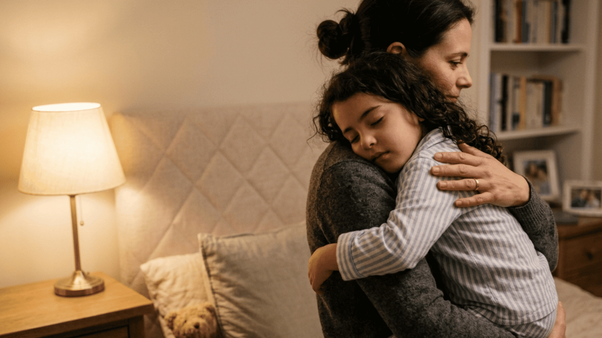 parent holding child upright after feeding to prevent ear pressure at night home care